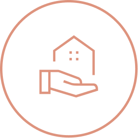 Light brown line drawing of a hand holding a house, symbolizing community at Village Clubs Camelback, in a circular border.