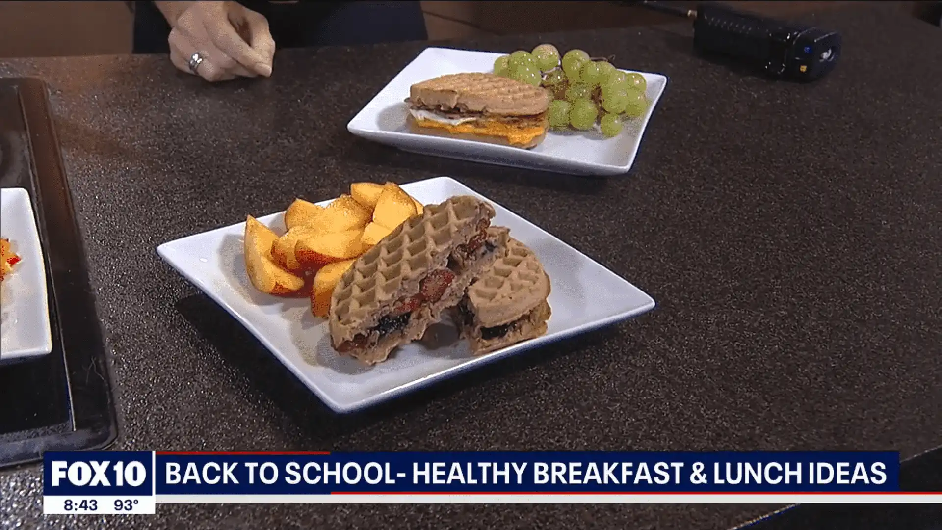 Healthy breakfast and lunch options at Village Clubs Camelback: waffle sandwiches, berries, peaches, sandwich with grapes.