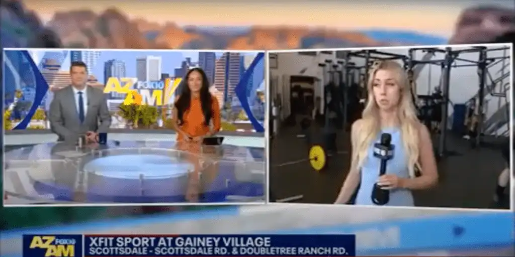 Village Clubs broadcast: anchors in studio and reporter covering XFit Sport live from Gainey gym in Arizona.